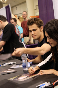 Paul Wesley and Torrey DeVitto sign autographs The cast of The Vampire Diaries were ready to bite in Toronto
