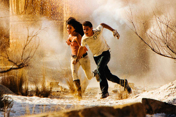 Shia LaBeouf and Megan Fox run from an explosion