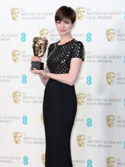 Anne Hathaway with her BAFTA Award