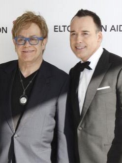 David Furnish says Elton John is well