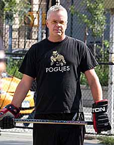 Tim Robbins playing street hockey
