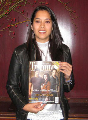 Stephanie Gobin holds the latest issue of Tribute featuring New Moon