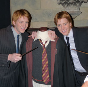 Fred & George Weasley brandish their wands