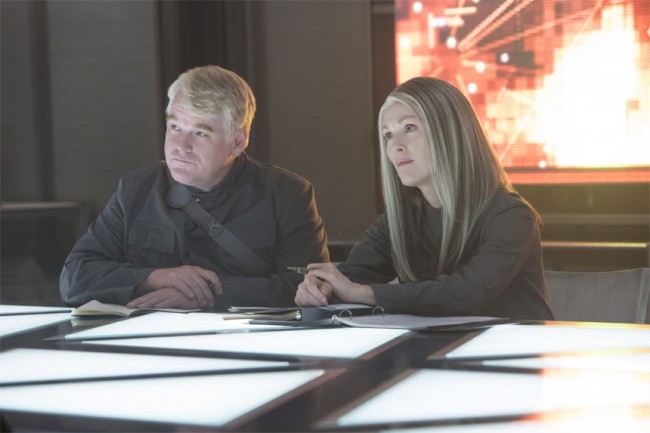 Plutarch’s smile when Katniss finally showed the true qualities of the Mockingjay as she stood up to President Coin.