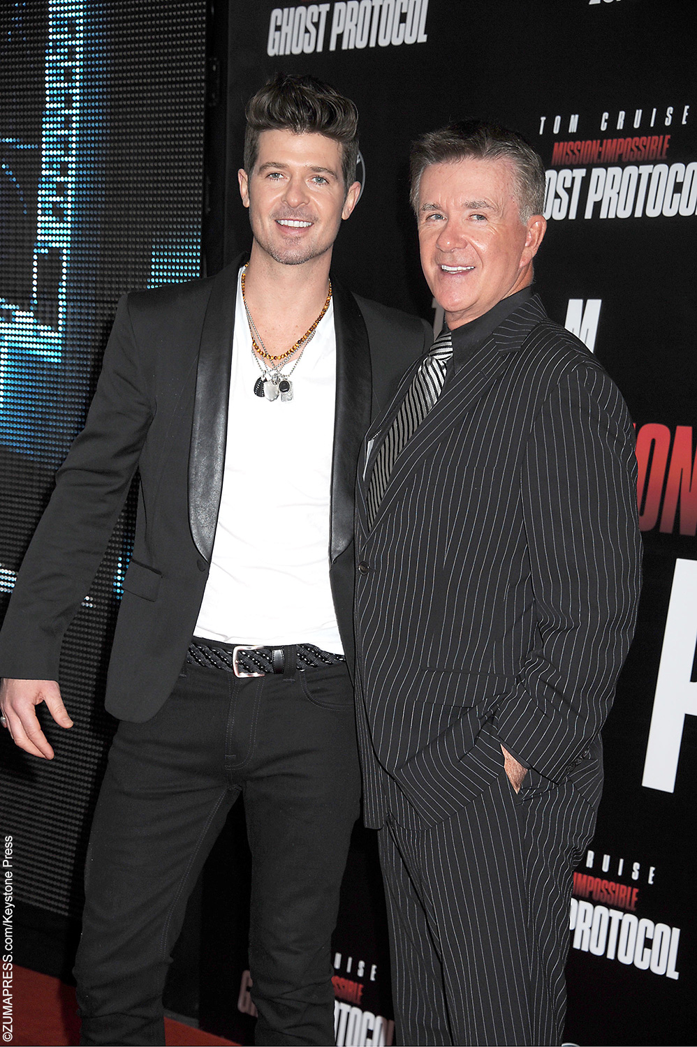 Want to know what Robin Thicke, whose mother is Gloria Loring, will look like in 30 years? Just take a look at his father. If Robin and Alan Thicke were the same age, we bet they would look like twins.