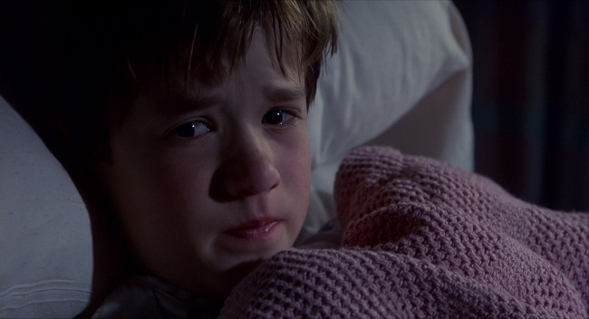 We promise, no spoilers. This is obviously from M. Night Shyamalan’s critically acclaimed 1999 horror thriller The Sixth Sense. The terrified and very cold nine-year-old Cole Sear (Haley Joel Osment) wants to tell his new friend, child psychologist Dr. Malcolm Crowe (Bruce Willis) a little secret… “I see dead people.”