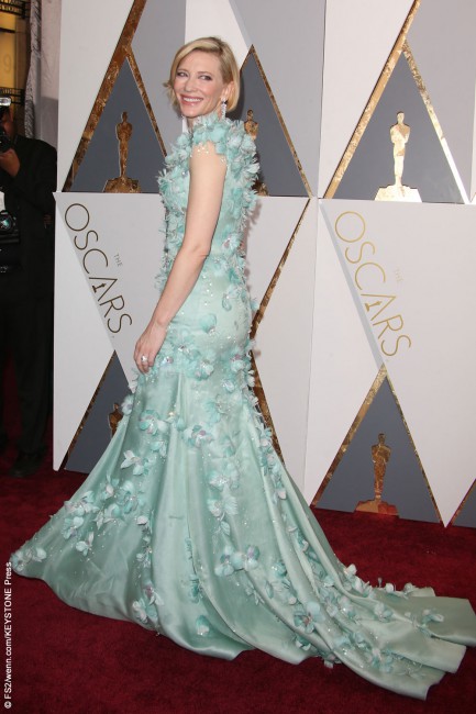 Best Actress Oscar nominee Cate Blanchett is a fashionista who’s not afraid to wear works of art, and this year is no different in this turquoise embellished Armani gown and Tiffany & Co. diamond earrings.