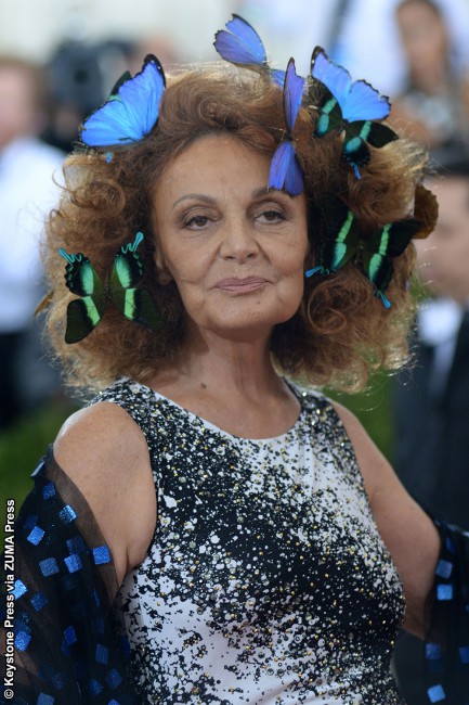 We can only assume designer Diane von Furstenberg is living in a fairytale…or some alternate reality. The butterflies attacking her hair (is this a Snapchat filter?) and the presumption that she thought this look was a wise choice suggest she is anywhere but planet Earth. Wearing a bizarre shawl and her own boring gown, it […]