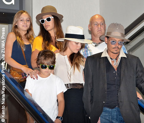 Left to right: Lily-Rose Depp, Jack Depp, a nanny, Amber Heard, a bodyguard and Johnny Depp