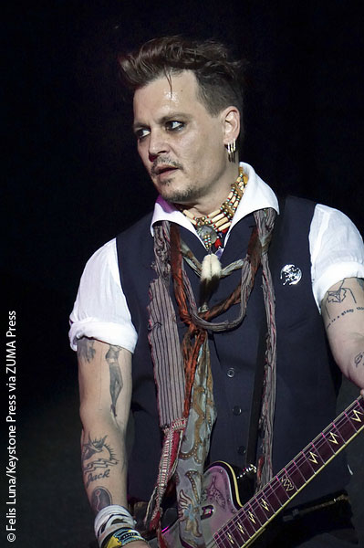 Johnny Depp playing guitar