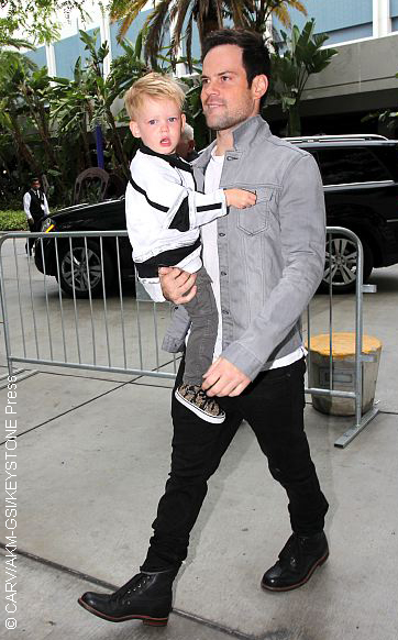 A photo of Mike Comrie and his son Luca (mother is Hilary)