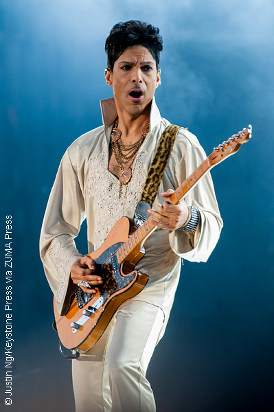 Prince performing in concert