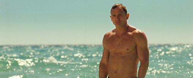 The opening scene in Casino Royale (2006) originally called for Daniel Craig to just lay over and float away in the water, but he managed to stumble upon a raised sandbank, which required him to come up out of the water. Triumphantly revealing Daniel’s chiseled body in the tiniest pair of blue swim shorts, the […]