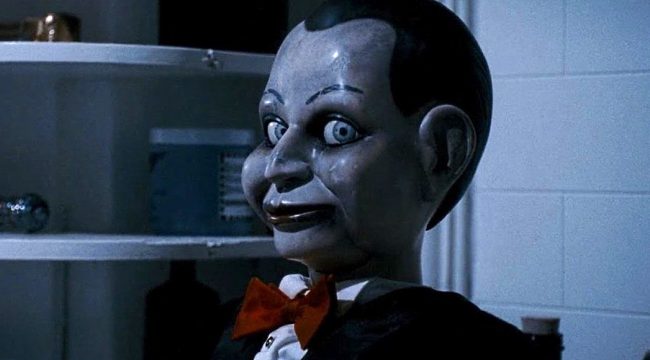 While Billy from Dead Silence (2007) doesn’t exactly have the mobility to be chasing down his victims, his sinister paranormal powers are just as horrifying. He is the property of his deceased (but still very active) and demonically evil ventriloquist owner, Mary Shaw, and is one doll that will haunt your dreams for sure.   