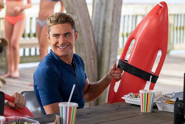 Zac Efron’s smile has the ability to melt hearts. His lovable grin and playful personality grace the big screen and red carpets throughout the world. The young actor is all smiles in High School Musical, 17 Again and The Greatest Showman.