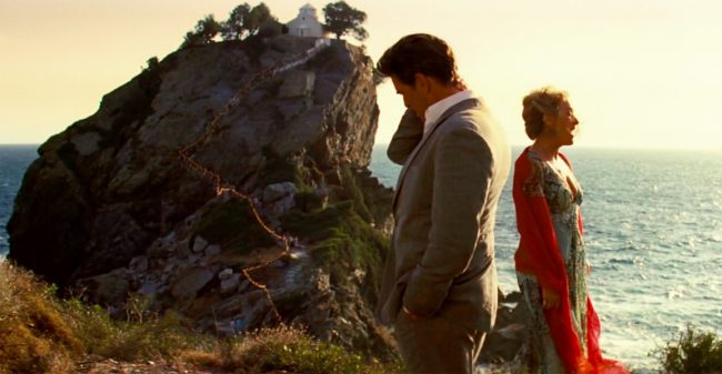 Donna (Meryl Streep) and Sam (Pierce Brosnan) sing “The Winner Takes It All,” which was filmed at the bottom of the rock.