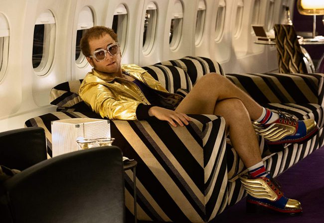 Taron Egerton has proven himself to be a bit of a chameleon, playing roles such as the Olympian “Eddie the Eagle,” a Kingsman and most recently, Robin Hood. In the biopic Rocketman, he gives us a well-rounded look at music superstar Elton John.   