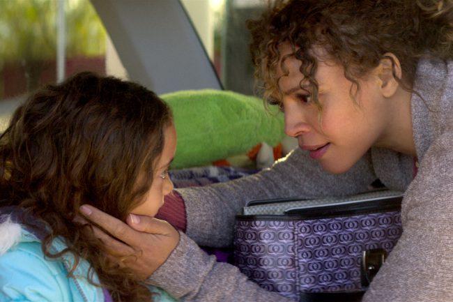 Katrina (Carmen Ejogo) is a single mother driving across the country to start a new life with her young daughter Clara (Apollonia Pratt). When their car breaks down in the middle of nowhere, and Katrina changes the tire, Clara wanders off and is bitten by a venomous rattlesnake. A mysterious woman shows up and miraculously […]