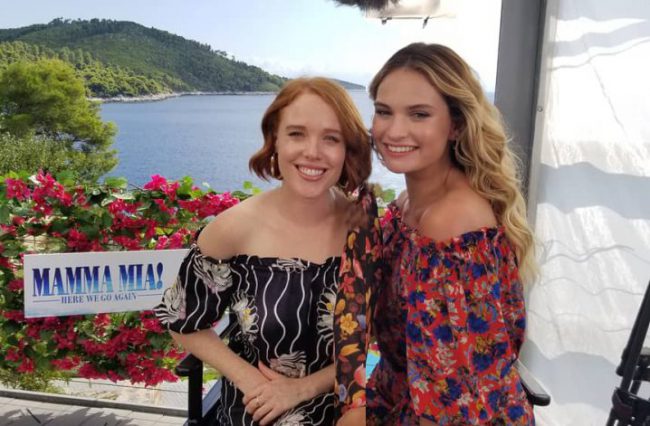 Jessica Keenan Wynn and Lily James chat about their favorite Mamma Mia! Here We Go Again songs, playing the young Dynamos and what they’d like to see in a third Mamma Mia! movie.