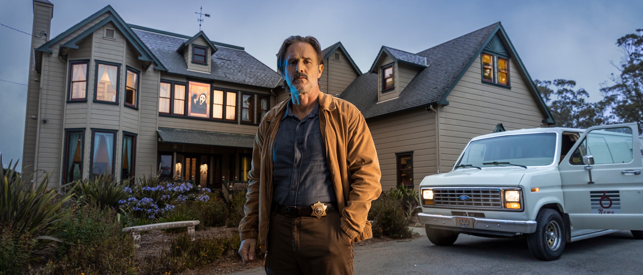 David Arquette in front of the original Scream house.