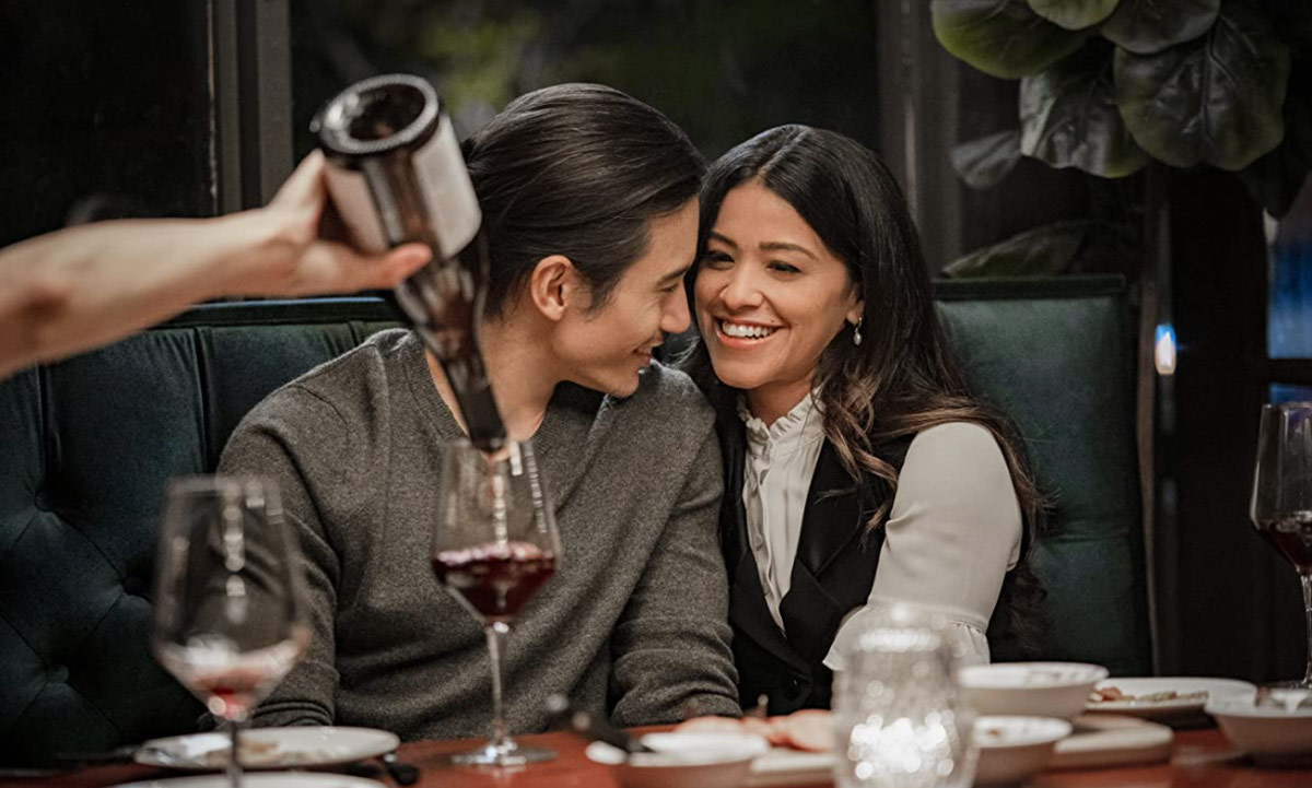 Manny Jacinto and Gina Rodriguez in I Want You Back. Photo by Jessica Miglio/ 2021 Amazon Studios