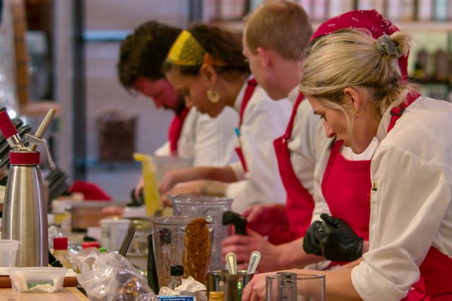 Living under one roof, eleven chefs use culinary skills and strategic plays in a tense cooking contest where they vote on who among them will win $100,000.