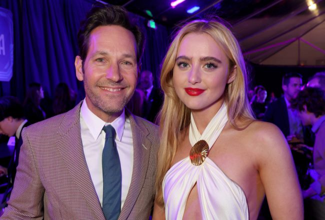 Paul Rudd (Scott Lang) and Kathryn Newton, who plays his daughter Cassie Lang in Ant-Man and The Wasp: Quantumania, smile for the cameras at Regency Village Theatre in Westwood, California.