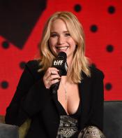 Jennifer Lawrence smiling while answering questions
