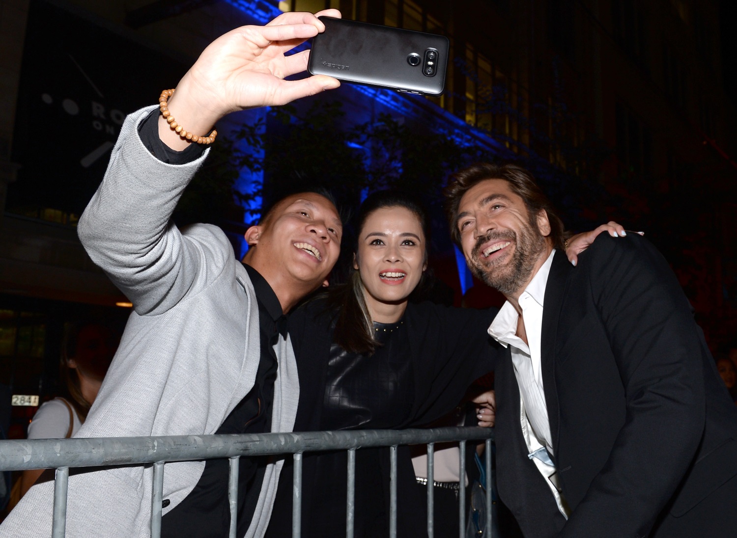 Javier posing for selfie with fans